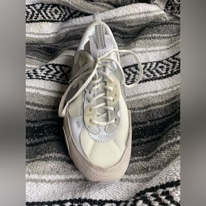 Never been worn, neural multi colored Nike Air sneaker, size 8 women’s.